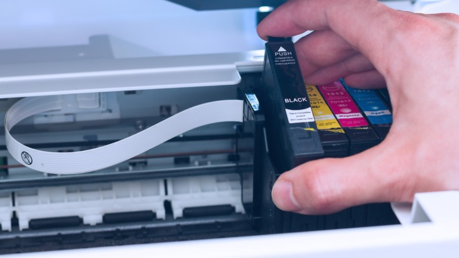removing_an_inkjet_printer_ink_cartridge_to_clean_the_heads